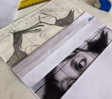 Imagem da atividade na aula de historia da arte, pintando com lápis cada quadrado para duplicar a foto